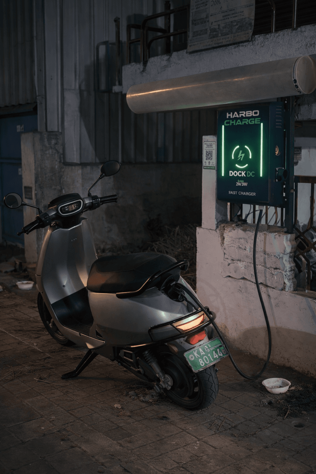 EV scooter charging at HarboCharge station